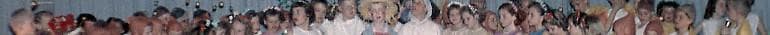 Long narrow stripe with faces of the cast of my 3rd grade play, me in the middle with straw hat.